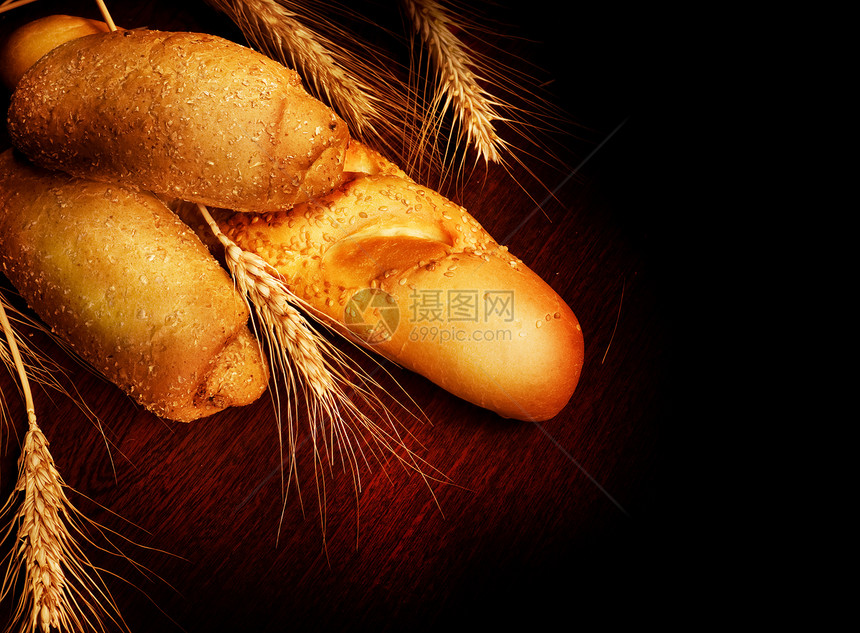 面包饼糕点金子谷物面粉耳朵木头芝麻太阳面包生活图片