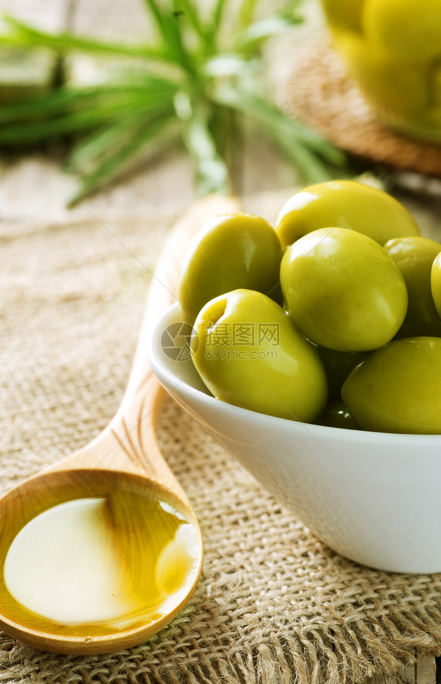 橄榄和橄榄油美食玻璃植物叶子水果烹饪黄色芳香环境处女图片