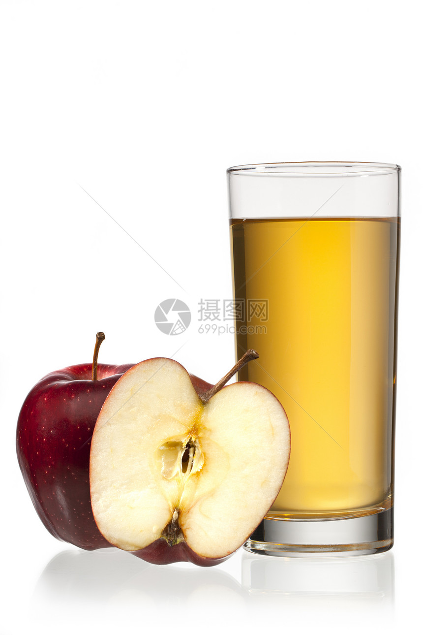 一个半苹果和苹果汁的图象图片