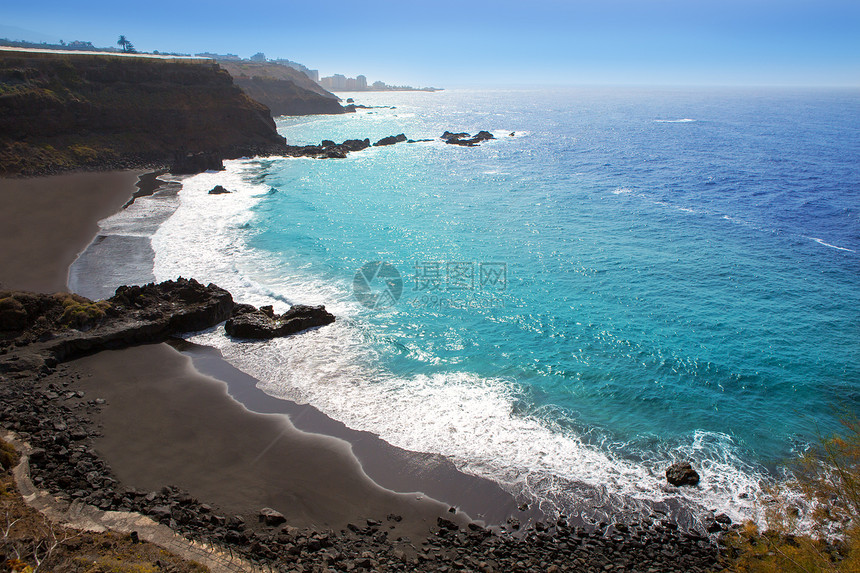 Bullullo海滩黑棕色沙和水情调岛屿沙漠海岸异国蓝色火山热带地标海景图片
