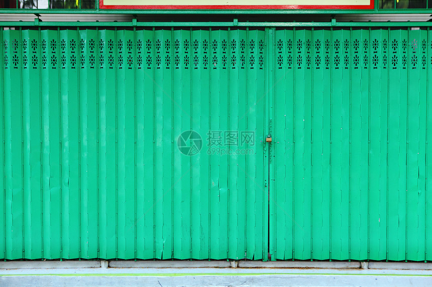 绿色金属门材料入口古董警卫工厂控制板床单建筑学盘子栅栏图片
