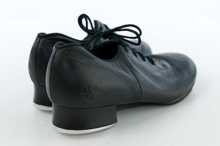 黑色塔布鞋和带冰丝的黑鞋对等背景图片