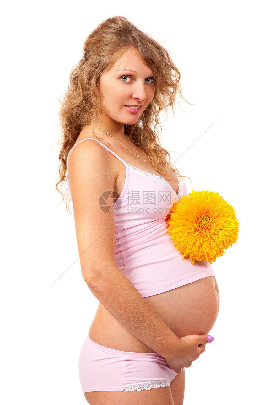 孕妇在抚摸她的肚子身体女孩婴儿女性母性腹部成人妈妈父母母亲图片