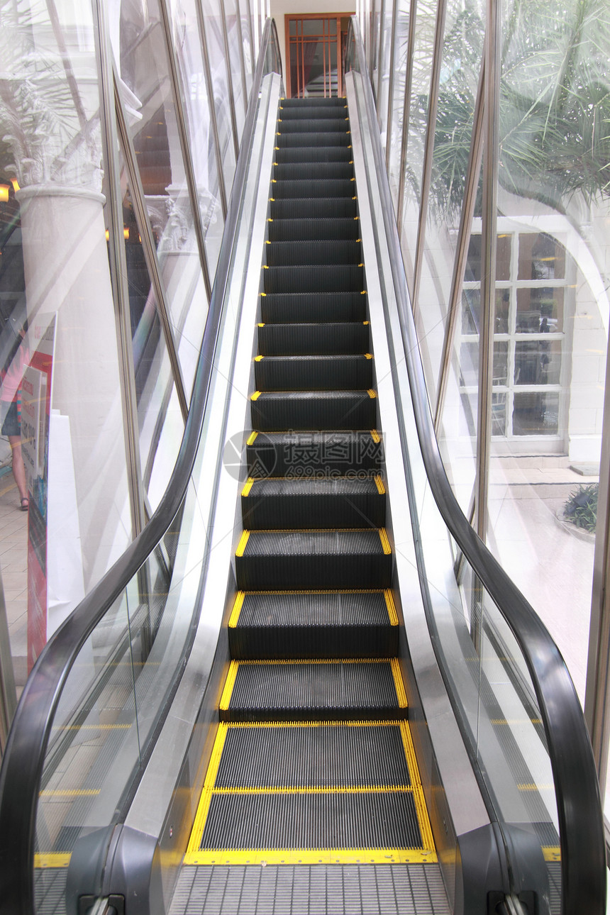 电扶车过境运动梯子脚步乘客游客商业喷射楼梯自动扶梯图片