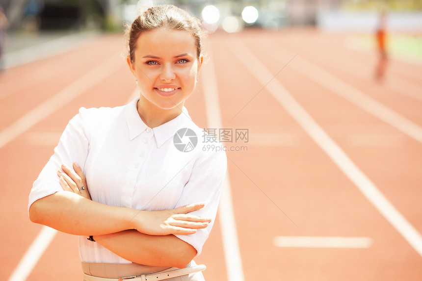 运动体育场女运动员商业管理员生意人跑步管理人员经理竞技服务活力场地衣领成人图片