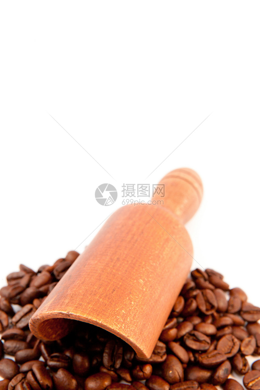木制铁铲加豆子咖啡图片