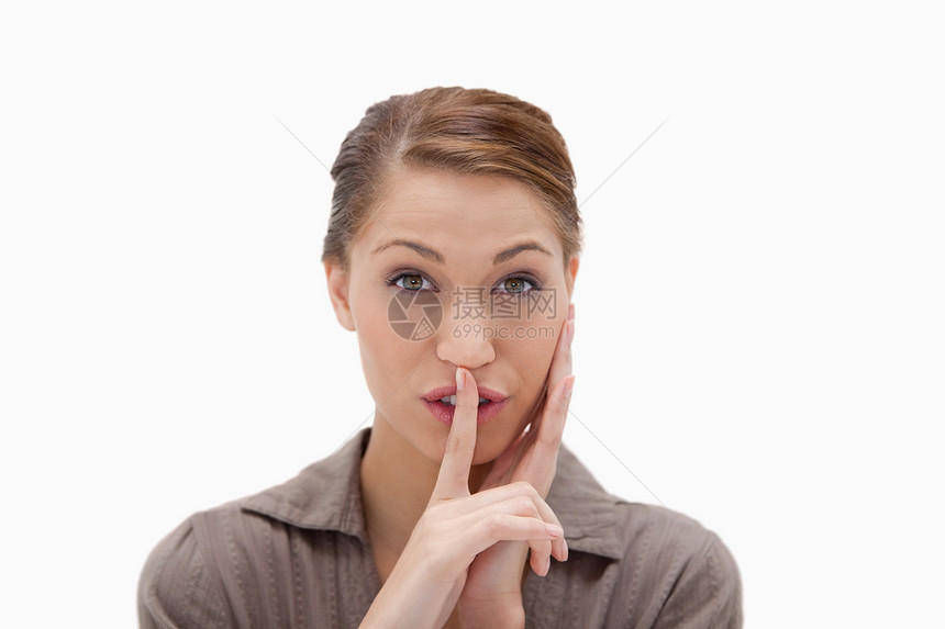 妇女要求保持沉默手指耳语白色秘密幸福工作室外表女性嘴唇手势图片