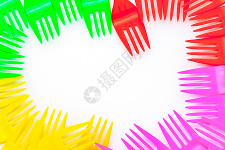 塑料餐具自助餐刀具营养商品烹饪餐饮粉色绿色橙子工具背景图片