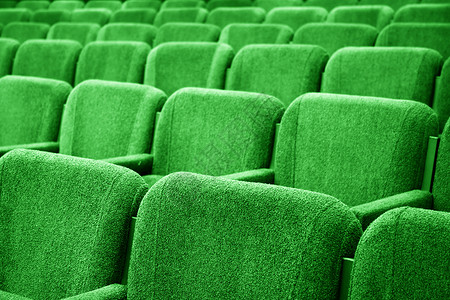 清空电影放映会背景展示椅子闲暇前提会议大厅绿色娱乐音乐会座位背景图片