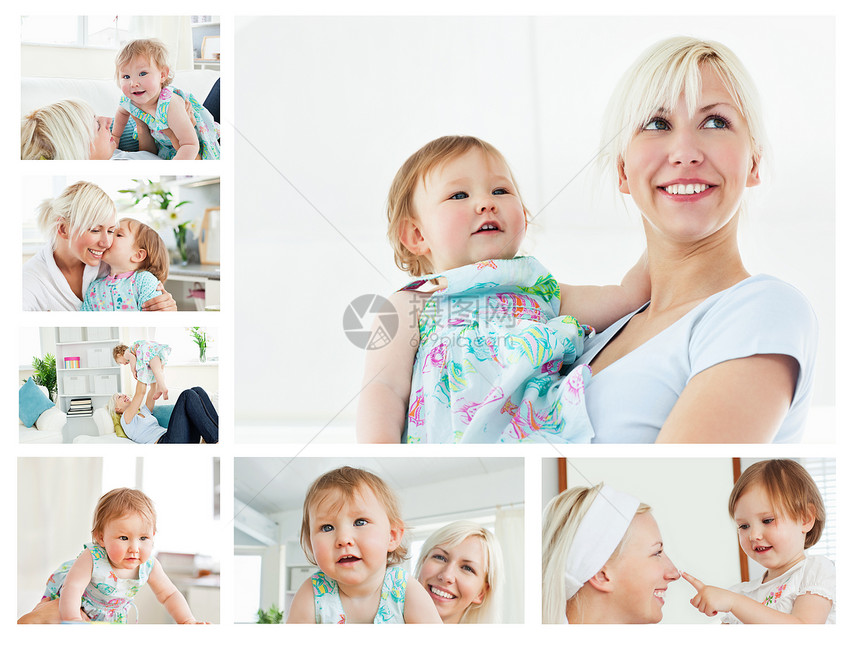 在客厅抱着婴儿的金发女郎被包起来图片