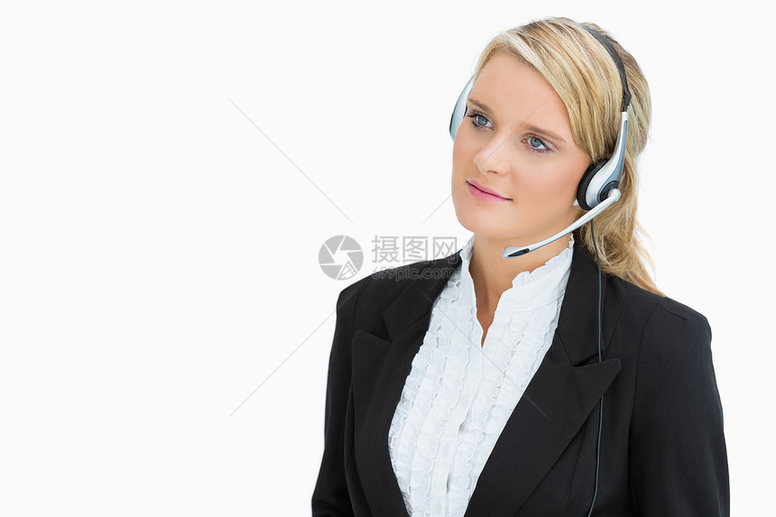 在呼叫中心工作的妇女套装金发女郎生意人浅色呼唤沟通互动长发头发女性图片