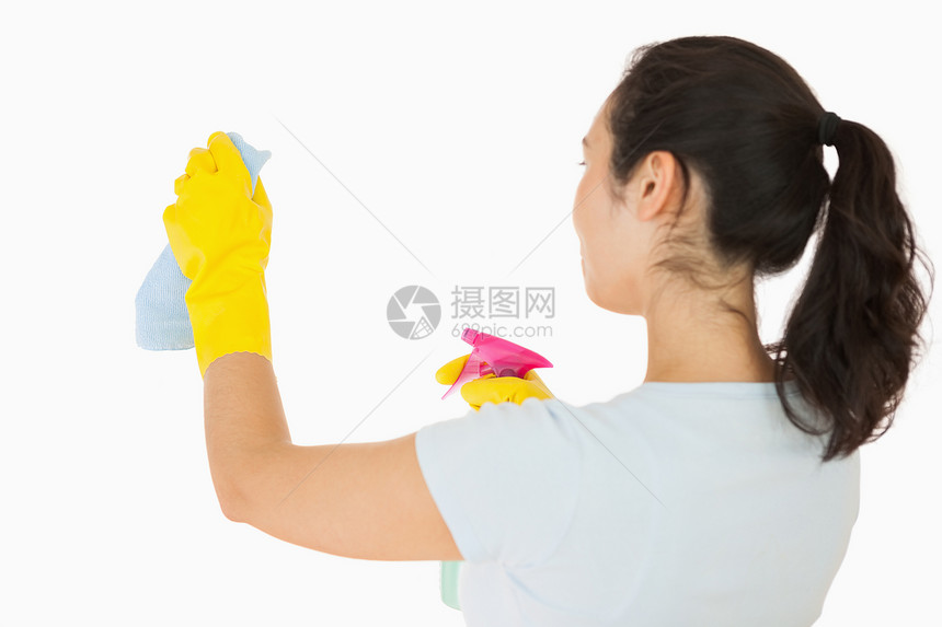 妇女清洗白墙图片