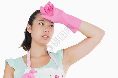 看起来很疲累的清洁女工背景图片