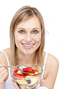吃水果沙拉的开心女人背景图片