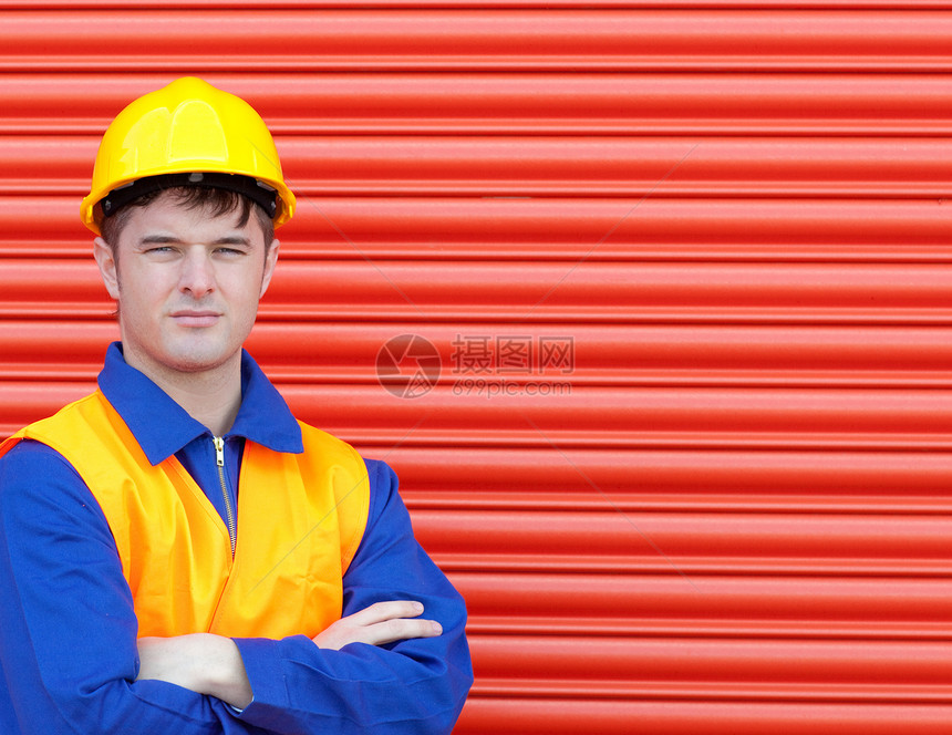 身着硬头巾的青年工人电工职业劳动维修承包商工具男人自信安全蓝色图片