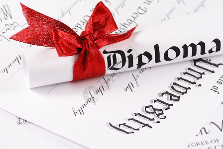 文凭文档滚动红色丝带羊皮纸成就学士大学学生证书背景图片