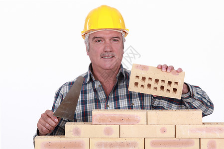 砖层建筑墙建筑工人砖墙工具职业建设者工作工地房子水泥石工男人高清图片素材