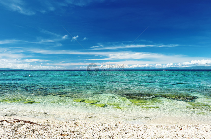 美丽的海滩边缘旅行海岸线荒野热带海浪天空海景风景地平线图片