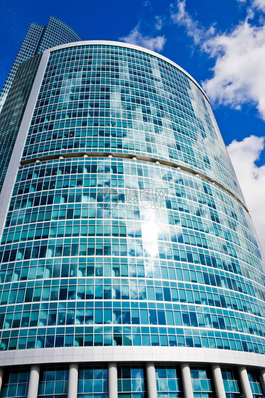 摩天大楼公司中心玻璃金融建筑学商业城市财产反射天空图片