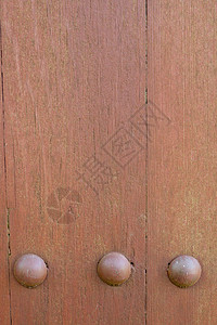 金属硬件和木材纹理螺丝螺栓建筑物指甲木工木头墙壁建筑背景图片