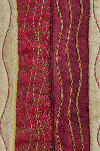 红布纹理织物起球皮棉材料红色皱纹衣服床单纺织品折痕背景图片