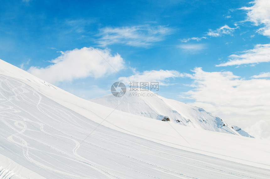 明亮的冬天天雪山冰川场景天空蓝色风景山脉旅行假期全景阳光图片