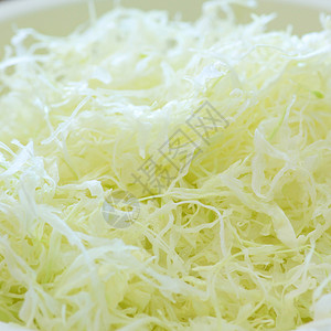 切菜卷心菜植物素食绿色农业庄稼蔬菜纹理沙拉手撕叶子背景图片