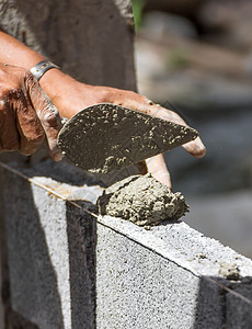 砖层工人职业房子男人工作水平男性瓦工劳动者石工石头高清图片素材