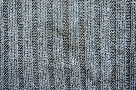 Grey knit 羊毛垫缝合布料背景工艺针织风格装饰纤维宏观棉布毛衣衣服灰色背景图片