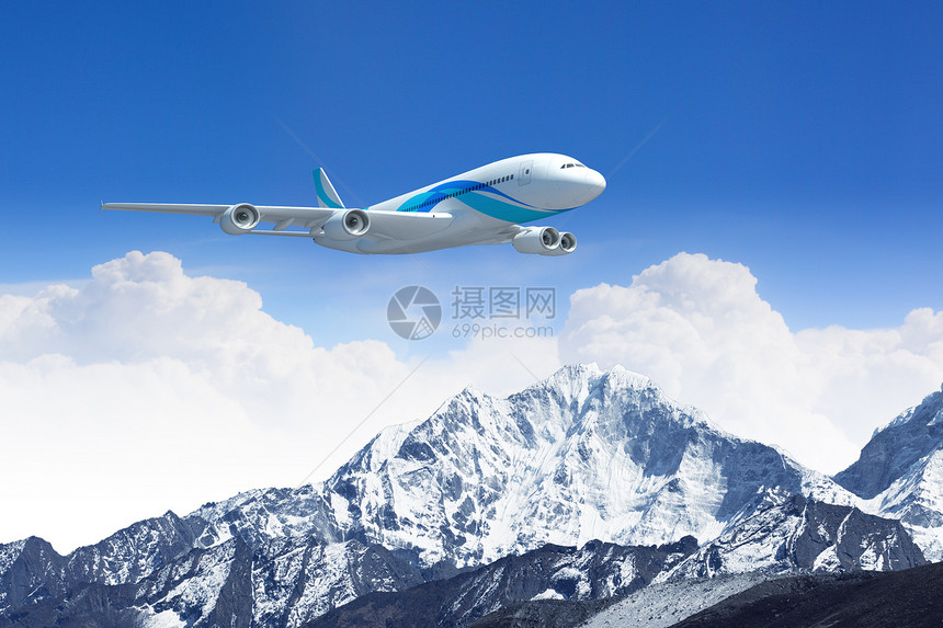 高山上空的白色客机假期机器风景蓝色太阳机身晴天涡轮旅行空气图片