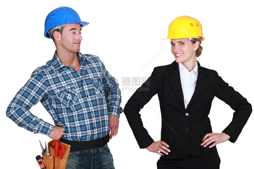 建筑师和她的工头白色经理职业头盔建造合作领班男人女性团队图片