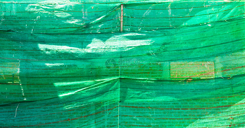 建筑中的绿色塑料胶网图片