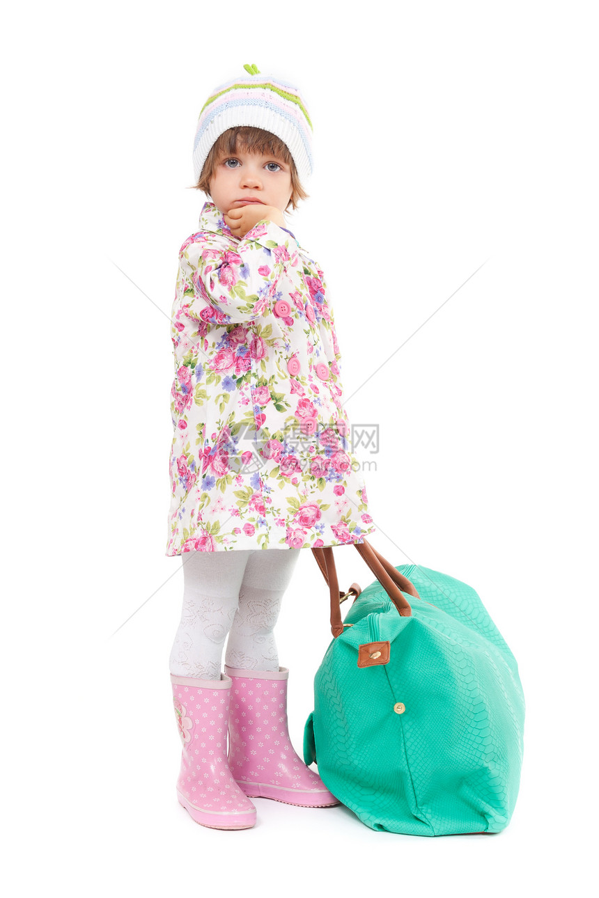 穿着秋装的漂亮小女孩 拿着大袋子 工作室左舷图片