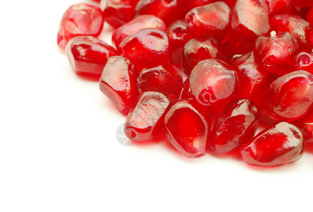 石榴浆果白色水果宏观食物红色石榴背景图片