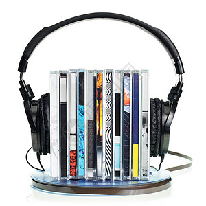 光盘背景CD堆叠和磁带上的耳机背景