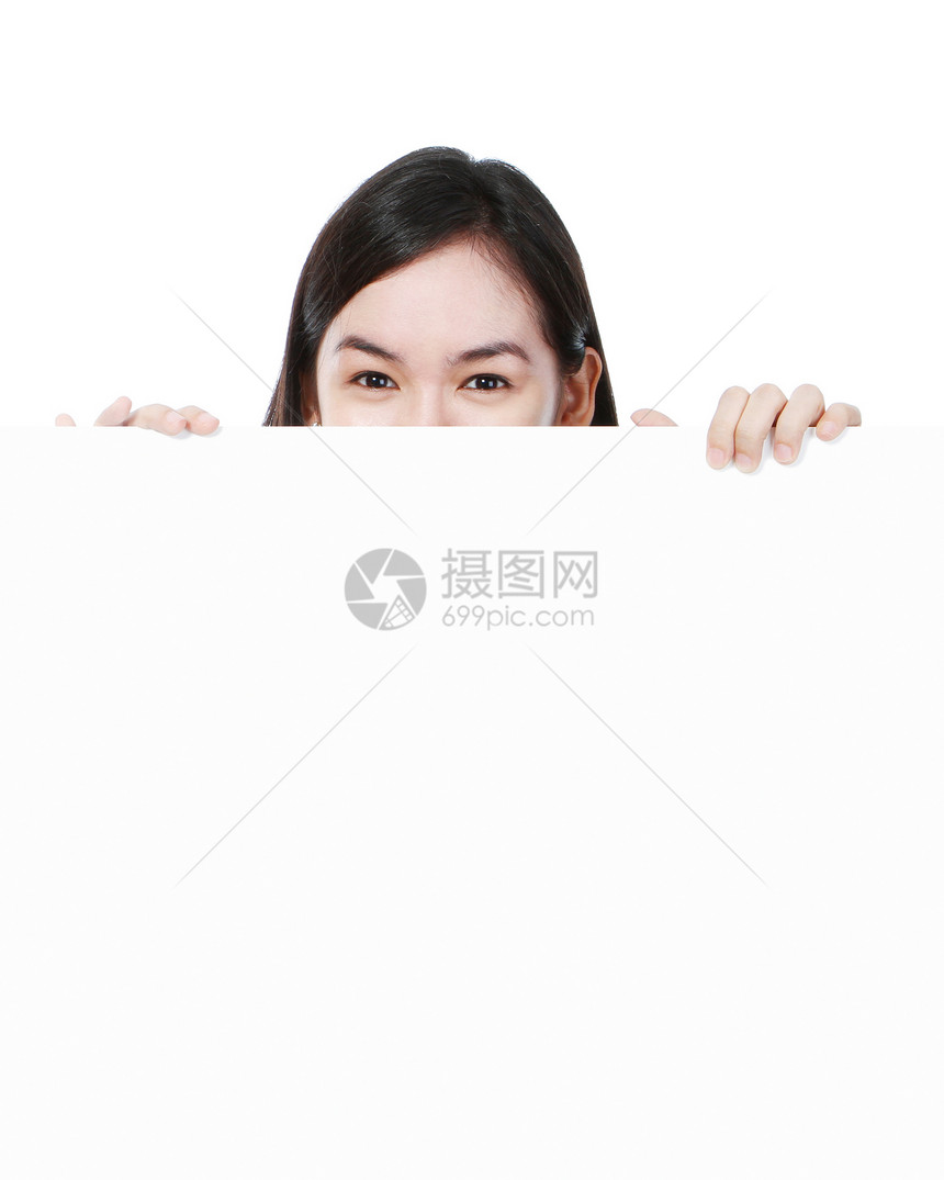 年轻女子偷看隐藏空格处木板空白背景白色广告空间女性图片