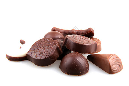 白色背景上孤立的朱古力糖果巧克力育肥牛奶美食小吃营养食物甜点诱惑背景图片