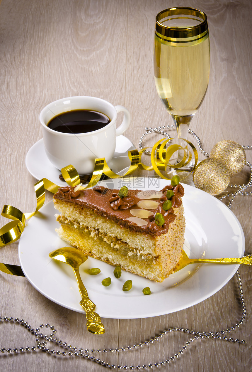 Halva蛋糕 Kaffe和香槟咖啡榛子馅饼食物美食盘子庆典奶油饮食金子图片