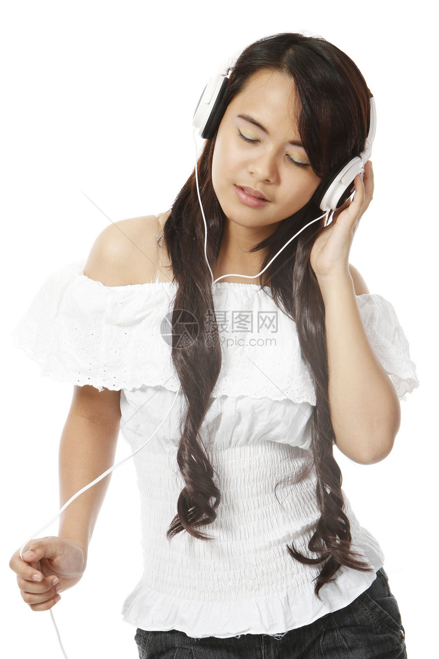 妇女听音乐享受女士成人白色女性音乐眼睛图片