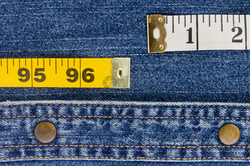 Denim上的测量磁带织物褪色纺织品按钮崎岖材料折痕精品衬衫统治者图片