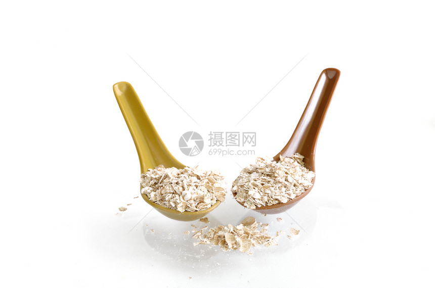 白上隔离勺子的燕麦片片小吃饮食养分谷物麦片食物营养稀饭薄片木头图片
