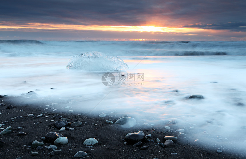 冰堡海滩海岸日落海景蓝色漂流运动冻结天空冰山支撑图片
