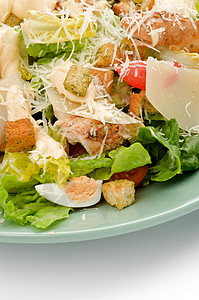 凯撒萨拉德菜盘美食家生菜盘子蔬菜食物沙拉酱料面包丁饮食背景图片