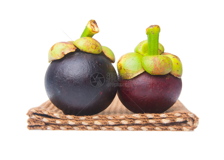 芒果水果和横截片 显示厚紫色皮肤美食白色果汁山竹圆形热带异国情调食物女王图片