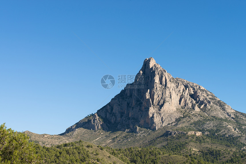 Puigcampana山峰岩石崎岖顶峰地标水平山脉晴天图片