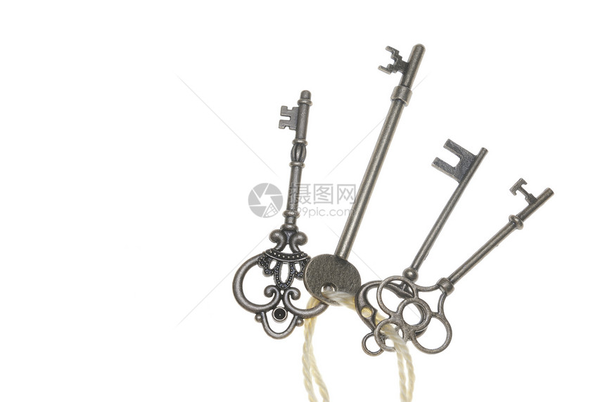 老旧密钥钥匙团体保障青铜绳索金属黄铜工具古董白色图片