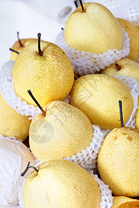 苹果篮子中国梨团体圆形苹果梨黄色公司静物营养泡沫沙梨白色背景
