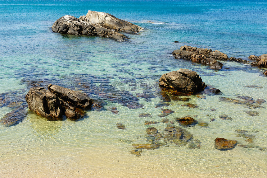 海滩景观支撑海岸线蓝色石头海浪椅子假期海岸岩石热带图片