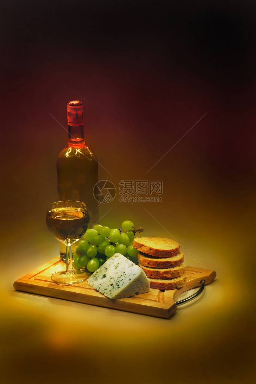 葡萄和奶酪玻璃餐厅藤蔓酒精木板饮料甜点产品瓶子酒杯图片