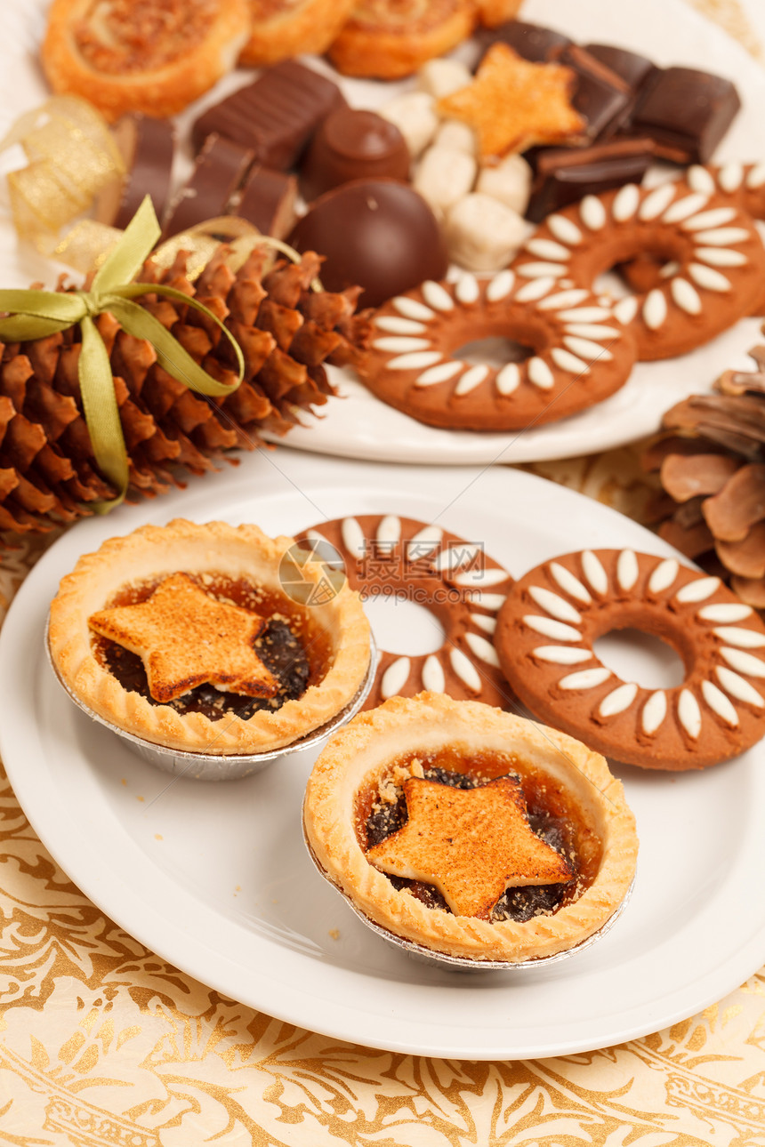 圣诞节甜点食物丝带金子馅饼水果星形香料照片巧克力文化图片